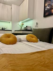 Posteľ alebo postele v izbe v ubytovaní Vintage Kącik Apartment