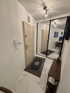 Posteľ alebo postele v izbe v ubytovaní Vintage Kącik Apartment
