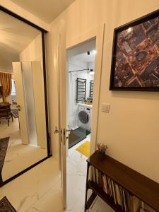 Televízia a/alebo spoločenská miestnosť v ubytovaní Vintage Kącik Apartment
