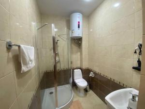 Koupelna v ubytování Dvoryanskiy Hotel