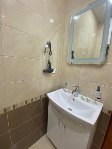 Koupelna v ubytování Dvoryanskiy Hotel
