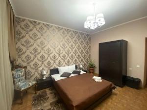 Postel nebo postele na pokoji v ubytování Dvoryanskiy Hotel