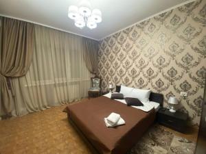 Postel nebo postele na pokoji v ubytování Dvoryanskiy Hotel
