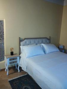 Letto o letti in una camera di La Casa di Patty