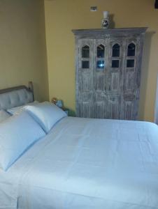 Letto o letti in una camera di La Casa di Patty
