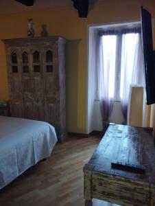 Letto o letti in una camera di La Casa di Patty