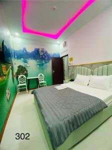 Postel nebo postele na pokoji v ubytování B & K Hotel - District 10