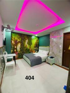 Postel nebo postele na pokoji v ubytování B & K Hotel - District 10