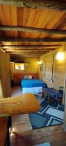 Voodi või voodid majutusasutuse TINY HOUSE Refugio de Mar toas