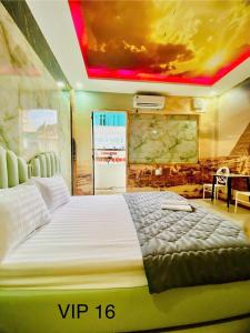Postel nebo postele na pokoji v ubytování B & K Hotel - District 10