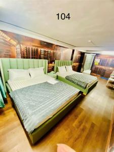 Postel nebo postele na pokoji v ubytování B & K Hotel - District 10
