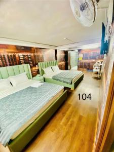 Postel nebo postele na pokoji v ubytování B & K Hotel - District 10