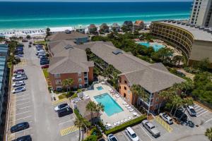 an aerial view of a resort with a pool and the beach at Gulfview II 318 in Destin