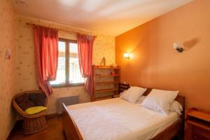 Giường trong phòng chung tại Les tourterelles +21 ảnh