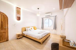 Postel nebo postele na pokoji v ubytování De Beach pool villa เดิน 3 นาทีจากชายหาด
