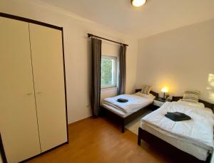 Ένα ή περισσότερα κρεβάτια σε δωμάτιο στο Family friendly house with a swimming pool Donji Zagon, Novi Vinodolski - 20568 +28 φωτογραφίες