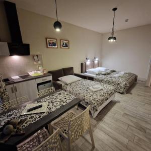 Posteľ alebo postele v izbe v ubytovaní Tajemniczy Ogród Szczytna - Bed & Breakfast
