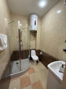 Koupelna v ubytování Dvoryanskiy Hotel