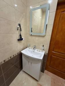 Koupelna v ubytování Dvoryanskiy Hotel