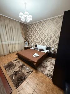 Postel nebo postele na pokoji v ubytování Dvoryanskiy Hotel