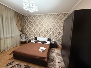 Postel nebo postele na pokoji v ubytování Dvoryanskiy Hotel