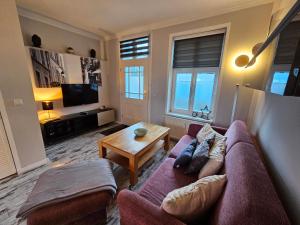 Μια τηλεόραση ή/και κέντρο ψυχαγωγίας στο Waldhaus Gertrud - 120 m zum Strand