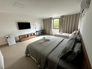 Postel nebo postele na pokoji v ubytování Hotel Formosa - Posto da Mata