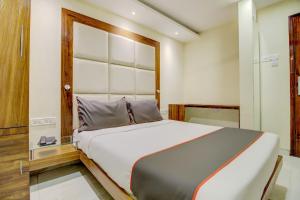 Postel nebo postele na pokoji v ubytování Hotel O Address Inn