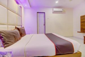 Postel nebo postele na pokoji v ubytování Hotel O Address Inn