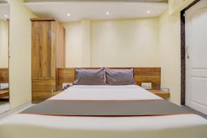 Postel nebo postele na pokoji v ubytování Hotel O Address Inn