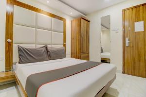 Postel nebo postele na pokoji v ubytování Hotel O Address Inn