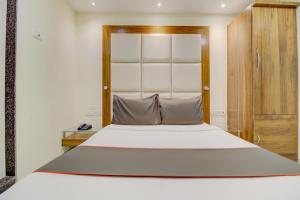 Postel nebo postele na pokoji v ubytování Hotel O Address Inn