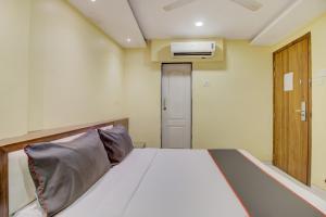 Postel nebo postele na pokoji v ubytování Hotel O Address Inn