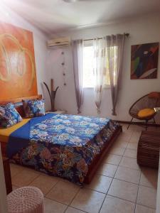 Postel nebo postele na pokoji v ubytování Villa proche lagon 5 pers à Etang-Salé les Bains