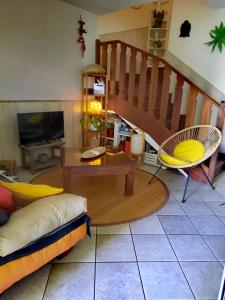 Posezení v ubytování Villa proche lagon 5 pers à Etang-Salé les Bains