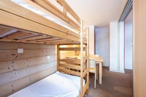 Giường trong phòng chung tại Séjour à la montagne - Les Silènes