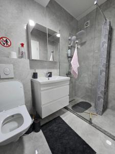 Koupelna v ubytování EEG Apartments