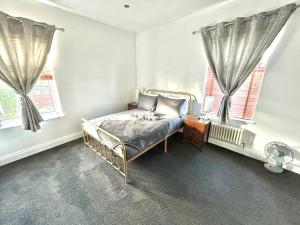 Postel nebo postele na pokoji v ubytování The Corner House