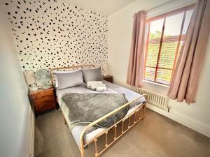 Postel nebo postele na pokoji v ubytování The Corner House