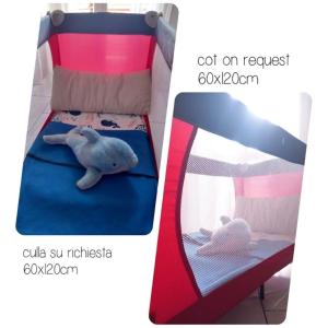 A bed or beds in a room at Giader's House - Free Parking