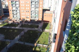 an aerial view of a courtyard in a city at Sun Apartments in Pristina