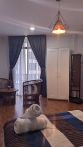 Postel nebo postele na pokoji v ubytování Tenang At Samsuria Beach Apartment