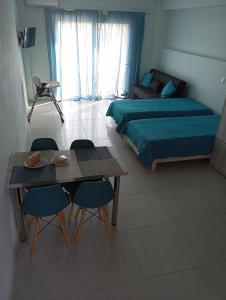 A bed or beds in a room at Lighthouse Apartments