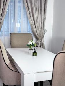 Ruang duduk di Goldeekoin Apartment and Hotel
