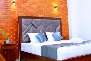 En eller flere senge i et værelse på TAffy REsort