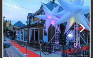 a building with stars on the side of it at Escape Mont Orford in Magog-Orford