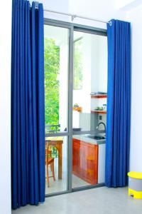 En balkon eller terrasse på TAffy REsort + 32 billeder