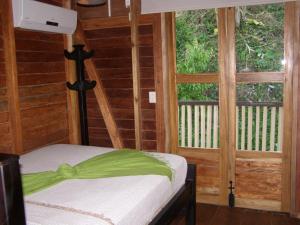 Giường trong phòng chung tại Ecolodge Luna del Rio