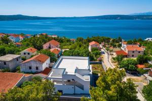 an aerial view of a town with a lake at Apartment ILUX-1 in Novigrad Dalmatia