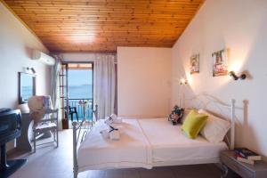 Postel nebo postele na pokoji v ubytování Casa Dei Venti Sea View Appartments
